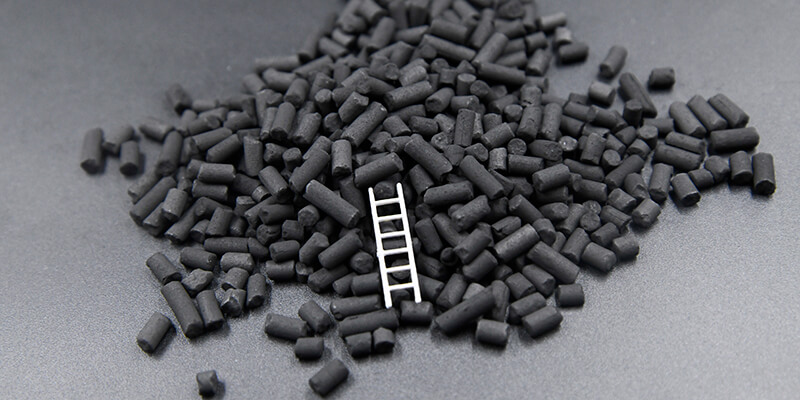 Carbón activado en pellets impregnado con KMnO4
